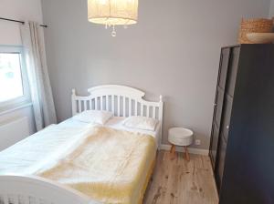 Postel nebo postele na pokoji v ubytování Apartament Tulia