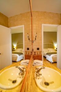 Koupelna v ubytování Hotel Alfonso IX