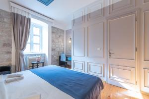 Postel nebo postele na pokoji v ubytování Kotor Nest