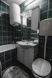 Phòng tắm tại Apartman ISKRA