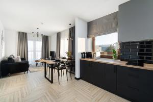 Kuchyň nebo kuchyňský kout v ubytování Esti Apartament nad Jeziorem Czorsztyńskim