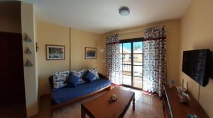 TV a/nebo společenská místnost v ubytování SUNSET HOUSE EL Cieno 10A