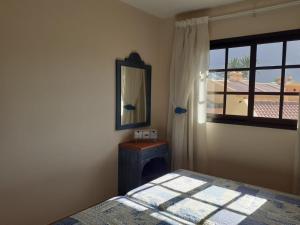 Postel nebo postele na pokoji v ubytování SUNSET HOUSE EL Cieno 10A
