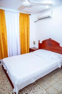 Postel nebo postele na pokoji v ubytování Aqui me quedo