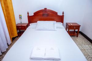 Ένα ή περισσότερα κρεβάτια σε δωμάτιο στο Aqui me quedo