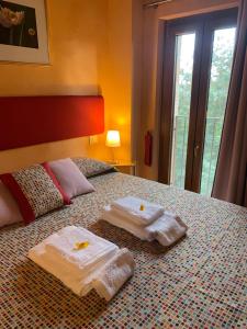 Postel nebo postele na pokoji v ubytování Dolce Vita in Tuscany B&B