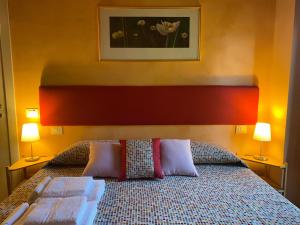 Postel nebo postele na pokoji v ubytování Dolce Vita in Tuscany B&B