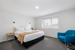 Кровать или кровати в номере Relax at Richmond Heights