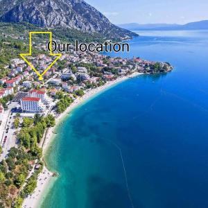 an aerial view of a resort on a beach at Apartments Goge - 90m from beach in Gradac