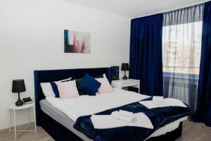 A bed or beds in a room at Maison Lux