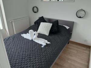 Posteľ alebo postele v izbe v ubytovaní Apartamenty Asis