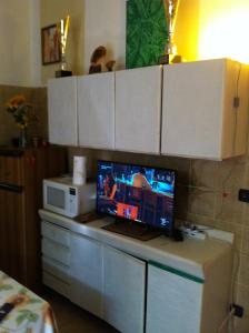 Kuchyň nebo kuchyňský kout v ubytování Casa "Oasi" Centro Storico