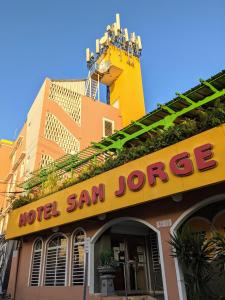 a hotel san jorge sign in front of a building at Hotel San Jorge in San Juan
