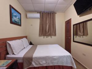 Postel nebo postele na pokoji v ubytování Hotel San Jorge + 20 fotografií