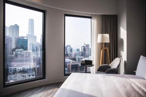 Ein Bett oder Betten in einem Zimmer der Unterkunft Page148, Page Hotels