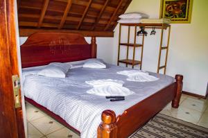 Llit o llits en una habitació de Pousada Vale Verde