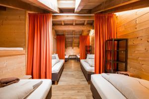 Ένα ή περισσότερα κρεβάτια σε δωμάτιο στο Rutsche Hostel