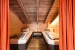 Ένα ή περισσότερα κρεβάτια σε δωμάτιο στο Rutsche Hostel