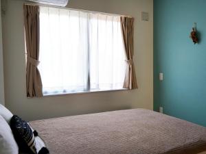 Fotografie z fotogalerie ubytování Guesthouse Koa v destinaci Mijakodžima
