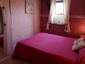Postel nebo postele na pokoji v ubytování Le Vieux Séchoir