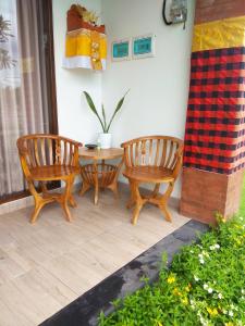 Posezení v ubytování Tamiu Guesthouse at Desa Wisata Keramas Near Keramas Surf Beach