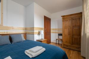 Posteľ alebo postele v izbe v ubytovaní Apartamenty Domino - Kościelisko