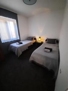 Кровать или кровати в номере Miido Apartments