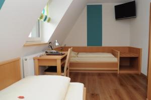 Postel nebo postele na pokoji v ubytování Hotel Schwarzes Ross