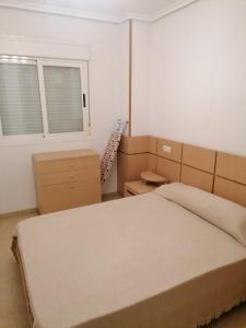 Postel nebo postele na pokoji v ubytování APCOSTAS Torremar - Oropesa