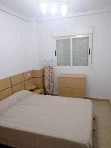 Postel nebo postele na pokoji v ubytování APCOSTAS Torremar - Oropesa