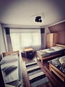 Posteľ alebo postele v izbe v ubytovaní Willa Mery