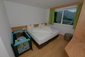 A bed or beds in a room at Mounira Ladis