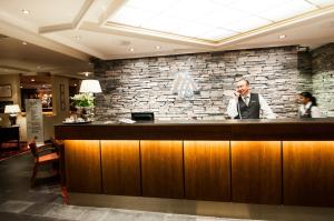 Členové personálu v ubytování Hotel Union Geiranger Bad & Spa