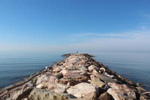 an island in the middle of the ocean at Hotel Massimo in Marina di Cecina