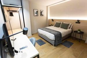 Säng eller sängar i ett rum på Apartamento Milano Living Suites en Vila real