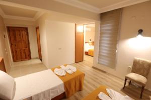 Postel nebo postele na pokoji v ubytování Luna Piena Hotel