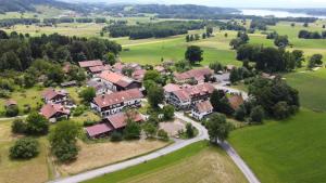 an aerial view of a large house with red roofs at Der Blankhof "Back to Roots" in Bad Endorf