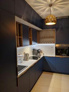 Gallery image of Nowoczesny Apartament przy Manufakturze z parkingiem podziemnym i klimatyzacją in Łódź