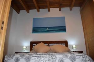 A bed or beds in a room at Vuelta Abajo Un lujo a tu alcance en Cartes