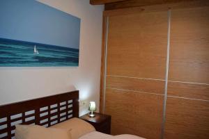 A bed or beds in a room at Vuelta Abajo Un lujo a tu alcance en Cartes