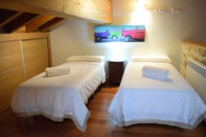 A bed or beds in a room at Vuelta Abajo Un lujo a tu alcance en Cartes