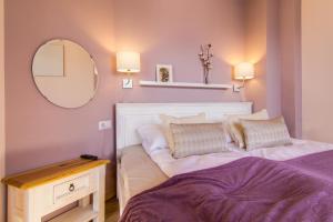 Posteľ alebo postele v izbe v ubytovaní Apartamenty Tatra View Kościelisko