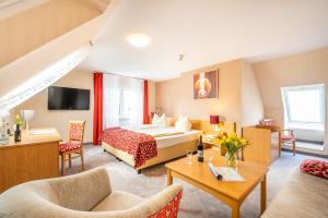TV a/nebo společenská místnost v ubytování Centralhotel Binz