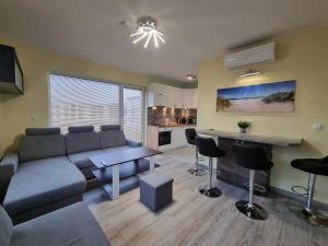 Area tempat duduk di Apartament Ambra Baltica- 365PAM