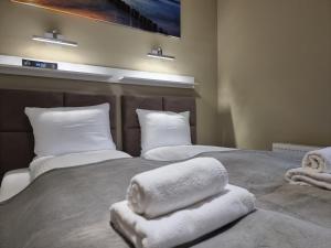 Postel nebo postele na pokoji v ubytování Apartament Ambra Baltica- 365PAM