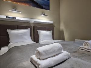 Posteľ alebo postele v izbe v ubytovaní Apartament Ambra Baltica - 365PAM