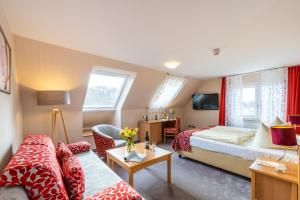 TV a/nebo společenská místnost v ubytování Centralhotel Binz