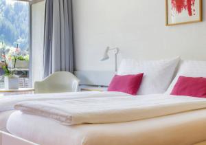Voodi või voodid majutusasutuse Hotel Kreuz Lenk toas