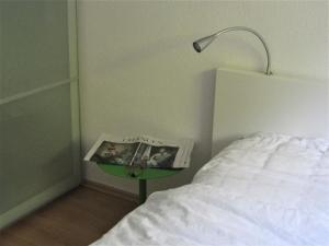 เตียงในห้องที่ Appartement Panoramablick