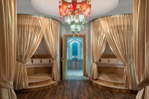 Кровать или кровати в номере Akra Fethiye Tui Blue Sensatori - Ultra All Inclusive